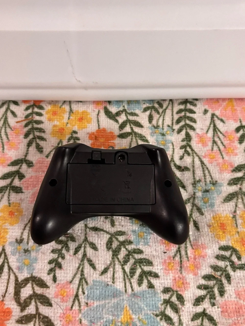 a 2.4GHz remote controller typically used for entry-level RC foam aircraft